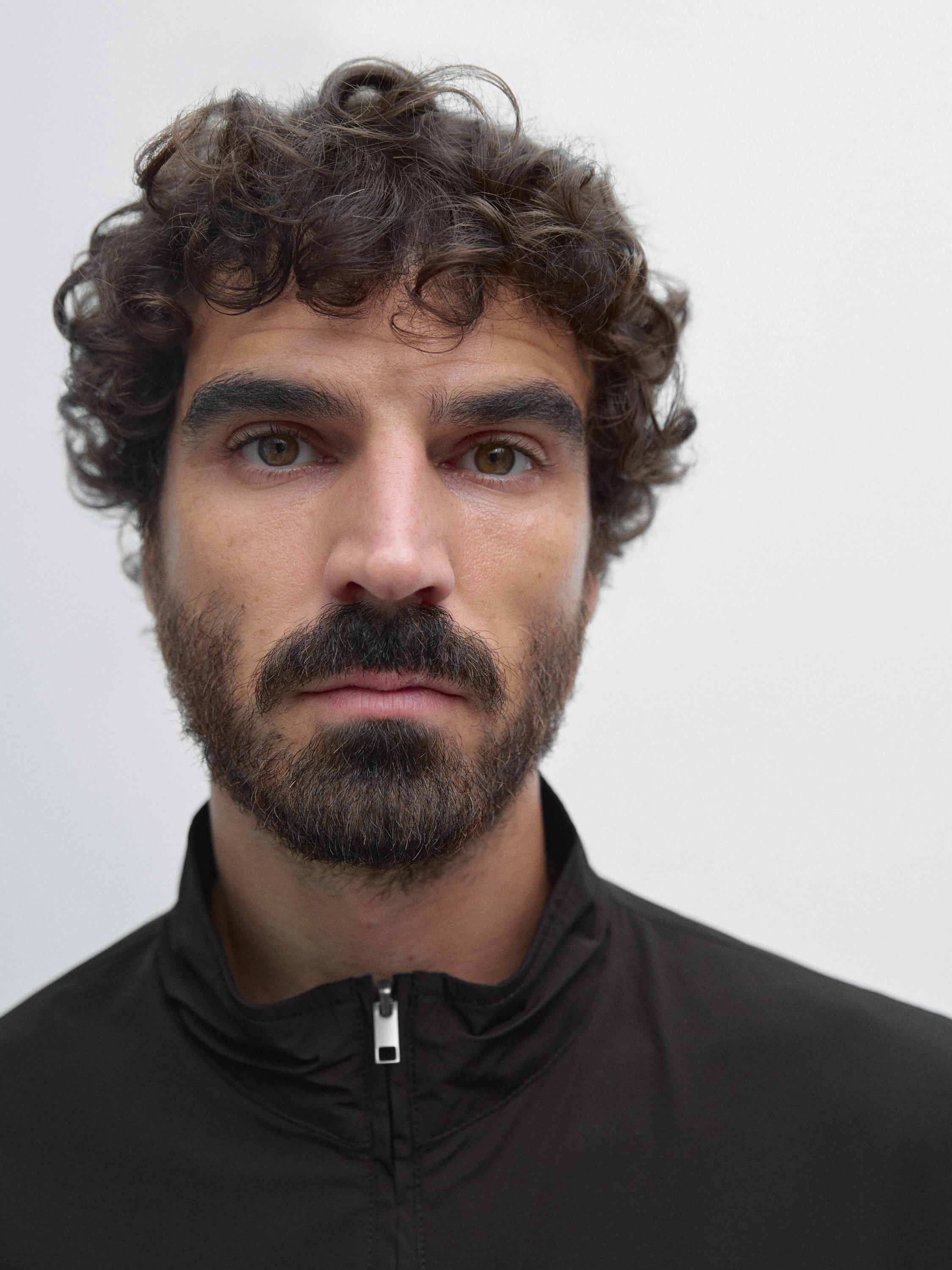 Veste réversible à col montant